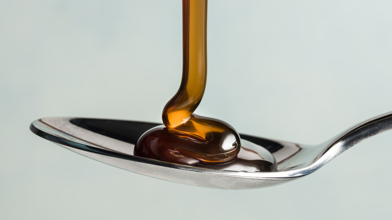 dark corn syrup on spoon