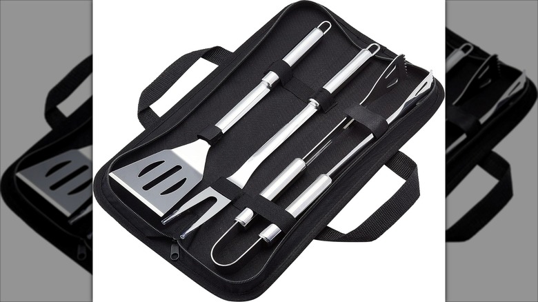 Product image of the Amazon Basics 4-piece stainless steel BBQ grilling tool set with carry bag
