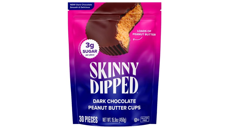 Skinny Dipped peanut butter cups on white background