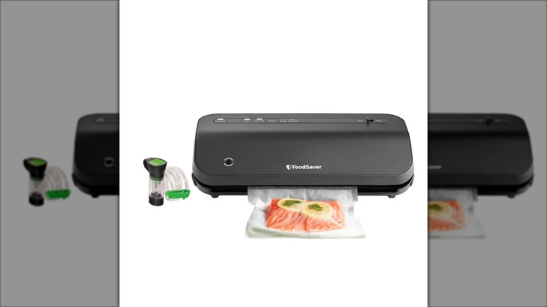 Product image of the FoodSaver preserve vacuum sealing system starter kit with bags and rolls