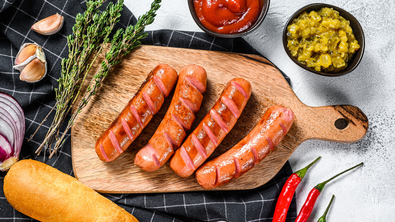 Sausages on cutting board