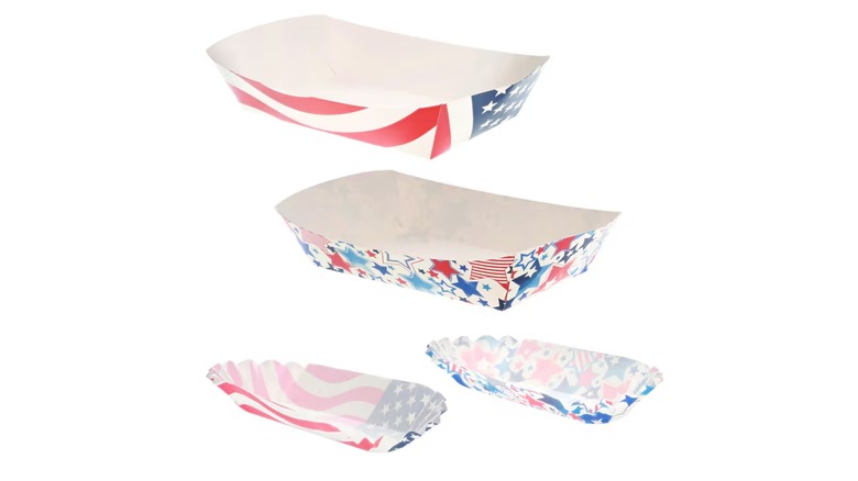 Paper hot dog holders in two different American patriotic designs, with paper liners in the same two designs