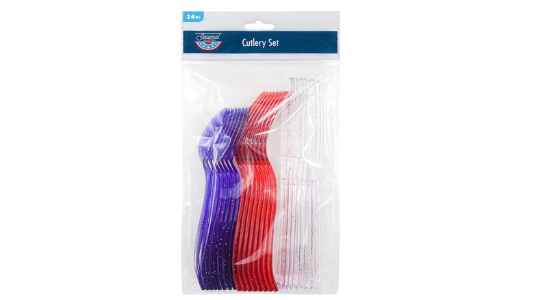A plastic bag of blue plastic spoons, red plastic forks, and clear plastic knives