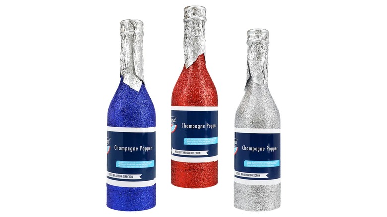Party poppers shaped like small red, white, or blue bottles of champagne