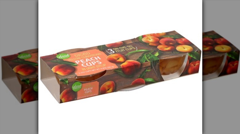 Peach cups on white background