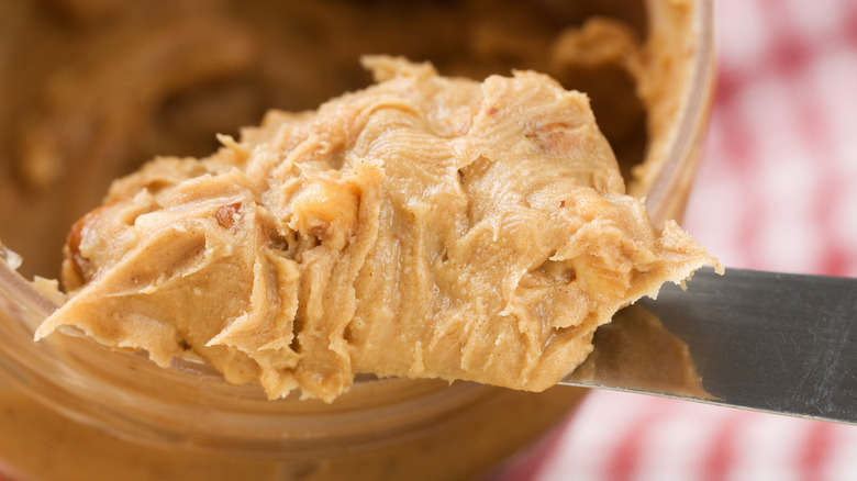 peanut butter on knife