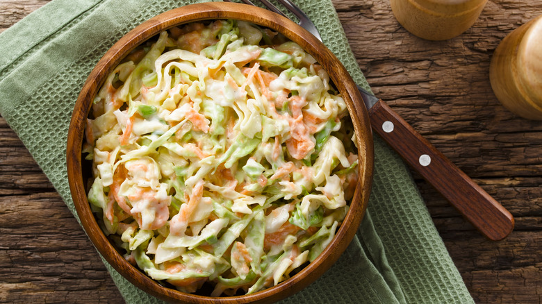 Bowl of coleslaw on linen