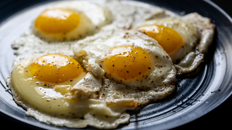 Fried eggs with black pepper