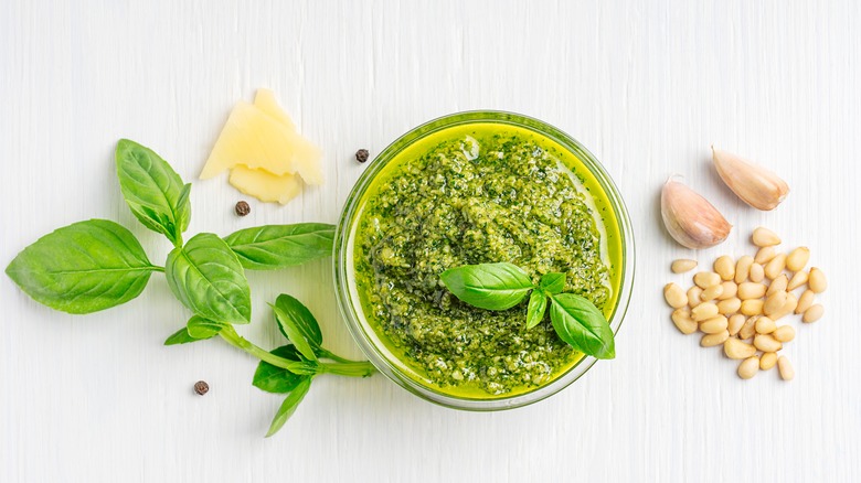 Homemade pesto and ingredients