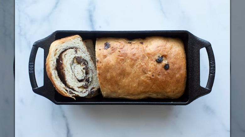 Lodge Cast Iron Loaf Pan on a countertop, filled with bread