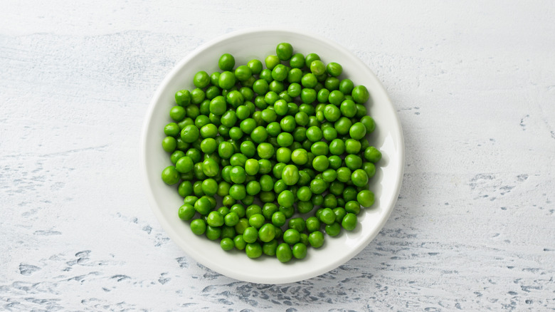 Peas in white bowl