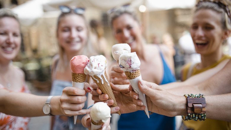 women holding ice cream cones