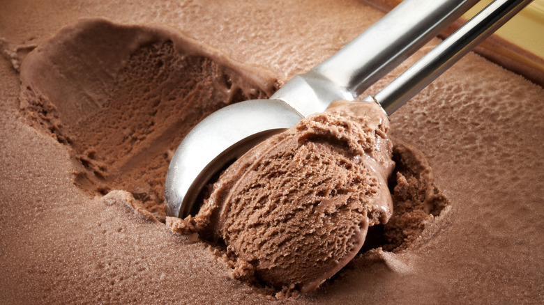 scooping chocolate ice cream