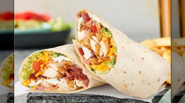 A Red Robin crispy chicken wrap cut in half