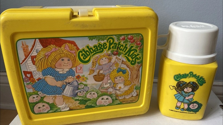 Vintage Cabbage Patch Kids lunchbox and thermos from the 1980s
