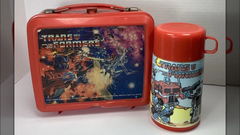 Vintage Transformers lunchbox and thermos from the 1980s