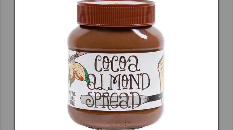 A jar of Trader Joe's Cocoa Almond Spread with a white background