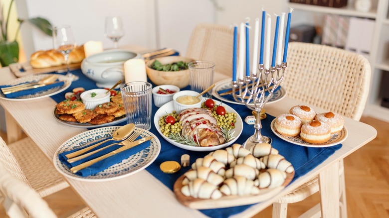 Hanukkah table with menorah