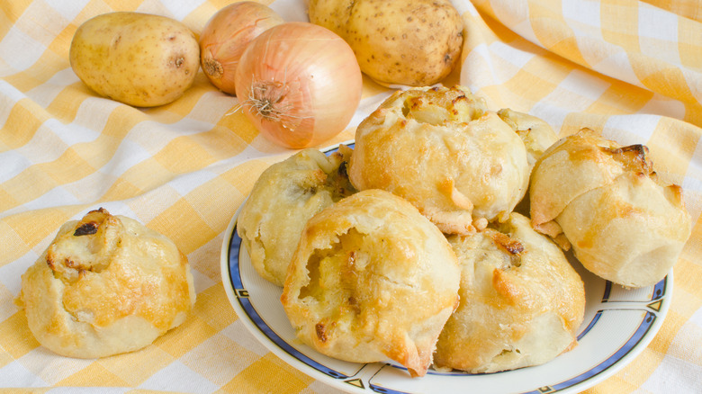 Potato knish plated on table