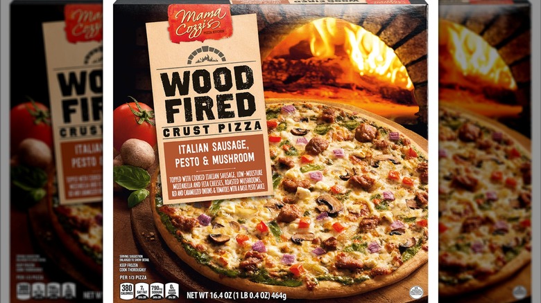 Box of Mama Cozzi's Pizza Kitchen Wood Fired Pesto Pizza against white background.