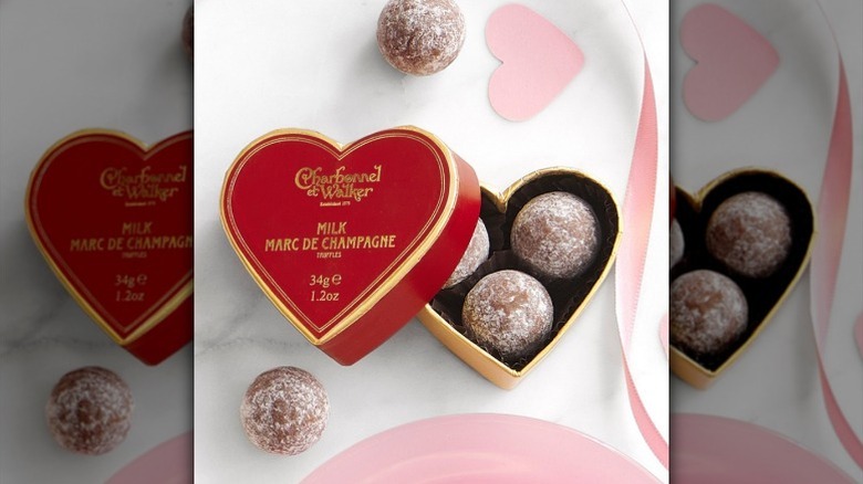 Charbonnel et Walker Truffle Box on counter with pink ribbon