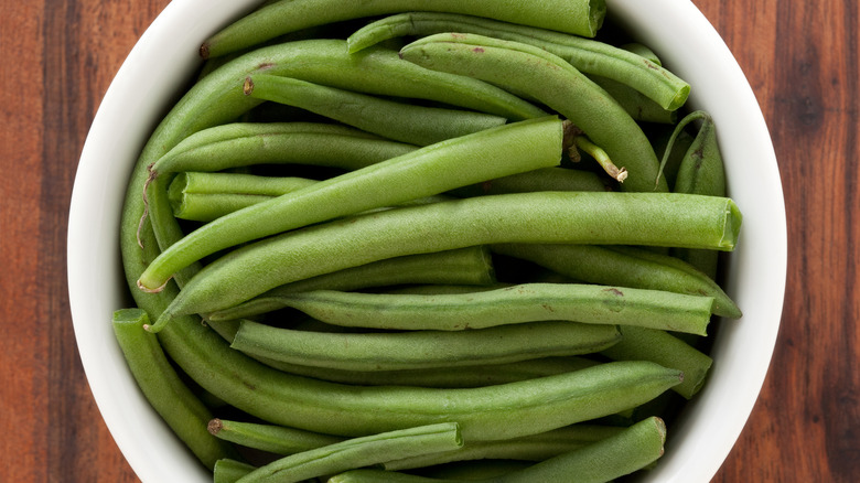 white bowl of green beans
