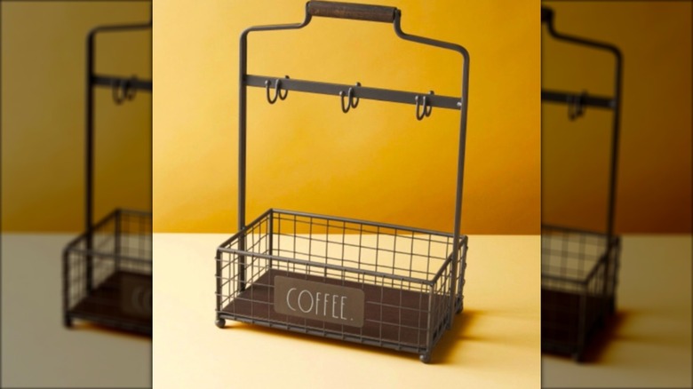 Coffee organizer with metal hooks and a metal basket