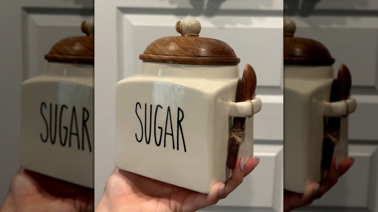 Ceramic sugar jar with wooden lid and wooden spoon