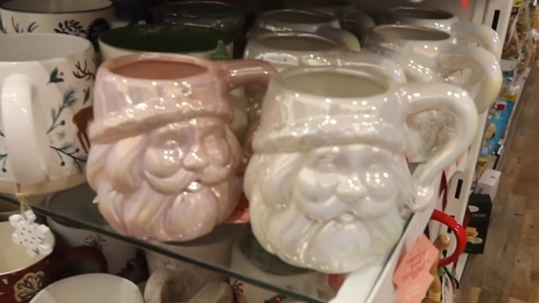 Mugs shaped like Santa's head, in shiny white and pink finishes