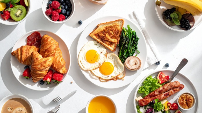 Various breakfast plates on a table