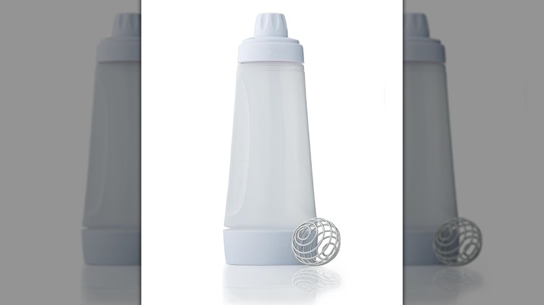 A Whiskware Pancake Batter Mixer on a white background