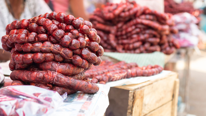 Heaps of choris being sold at a local market
