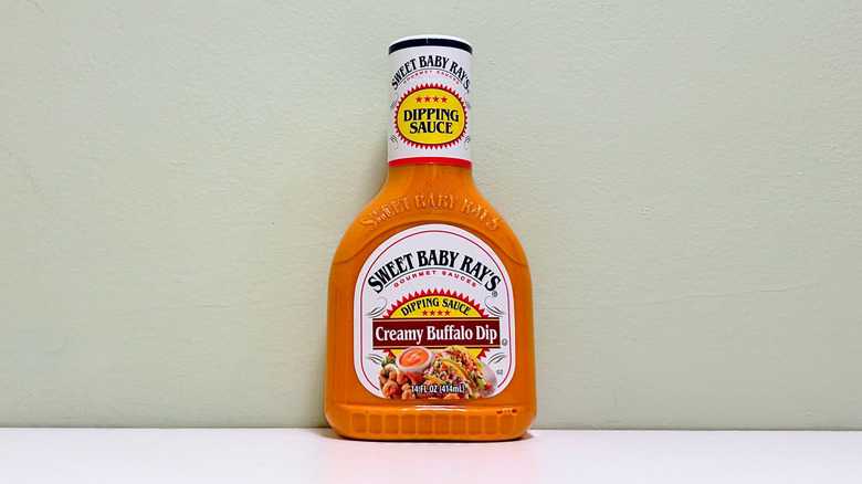 A bottle of Sweet Baby Ray's Creamy Buffalo Dip Sauce
