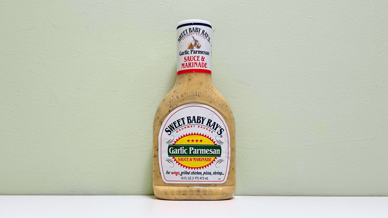 A bottle of Sweet Baby Ray's Garlic Parmesan Sauce