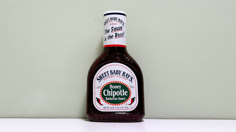 A bottle of Sweet Baby Ray's Honey Chipotle Barbecue Sauce