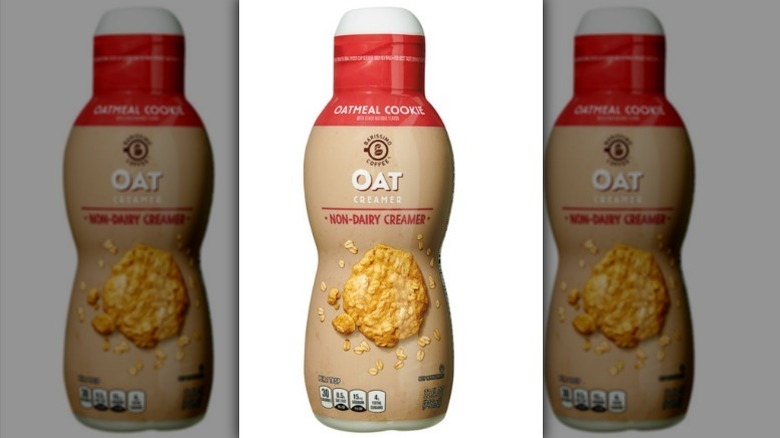 Barissimo oatmeal cookie oatmilk creamer with a tan and red bottle on white background