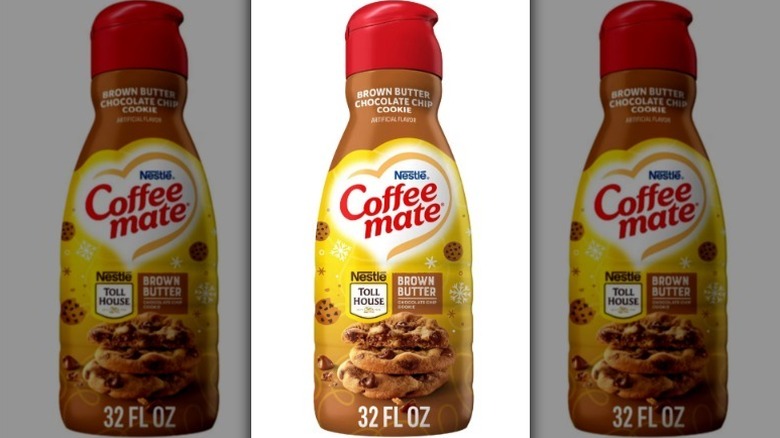 Coffeemate brown sugar chocolate chip cookie creamer in a yellow, tan, and red bottle on white background