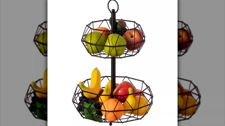 Fruit basket with fruit on white background