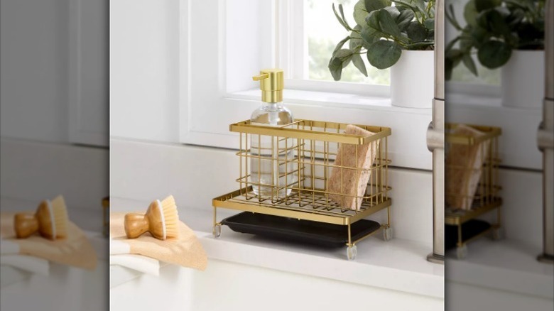 Caddy organizer sits by sink