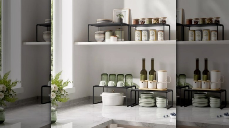 Shelf organizers sit on counter with kitchen items