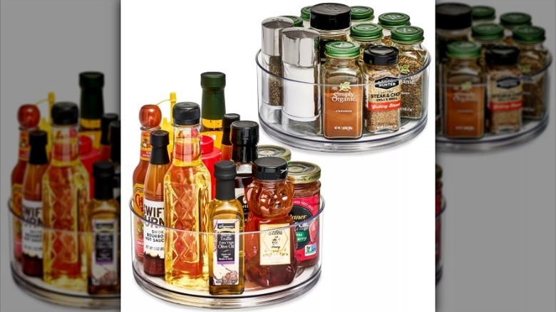 Lazy Susans with kitchen items on white background