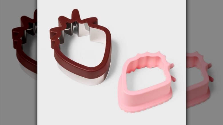 Strawberry shaped sandwich cutters on white background