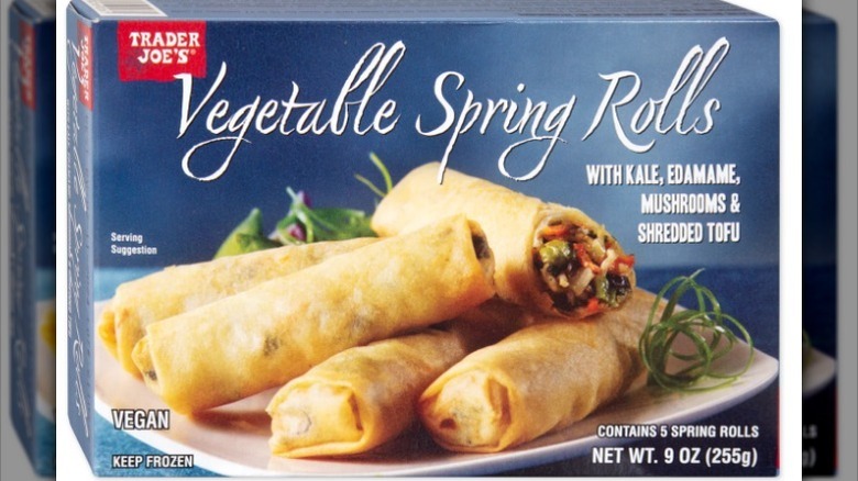 Blue vegetable spring rolls box on white background
