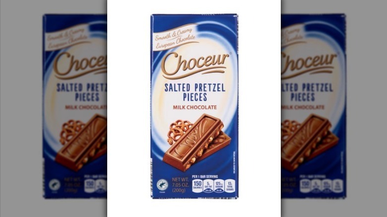 Salted pretzel pieces chocolate bar on white background