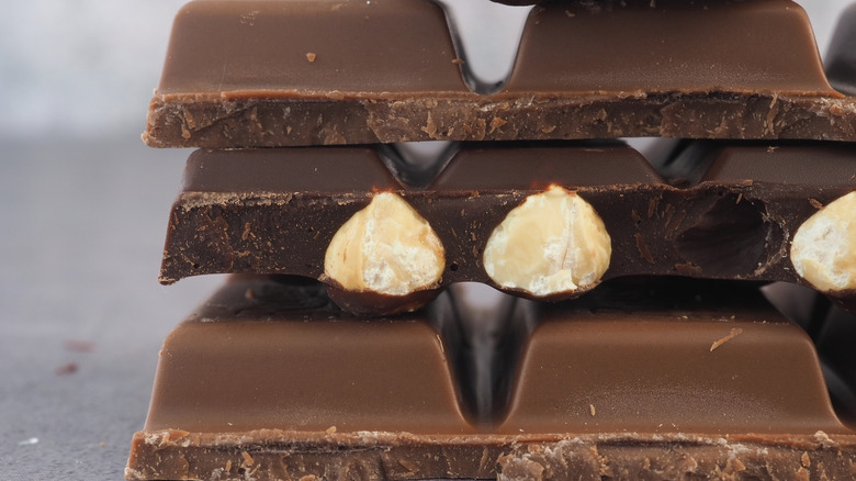 Up close view of stack of different chocolate bars