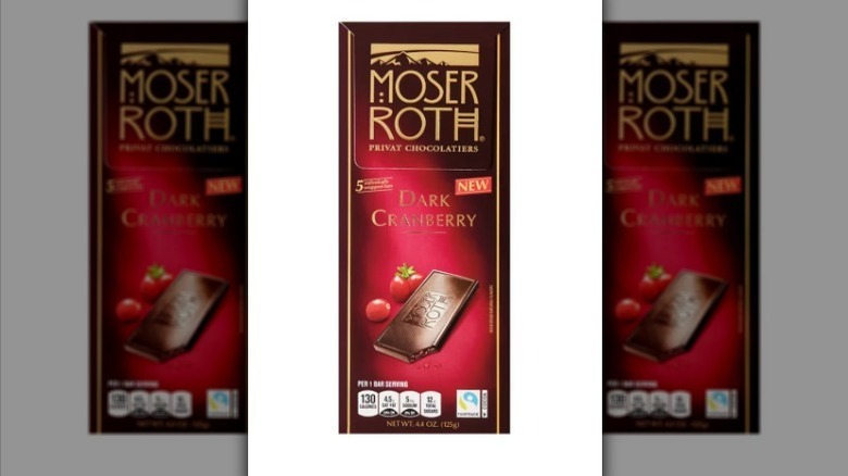 Dark cranberry chocolate bar on white background