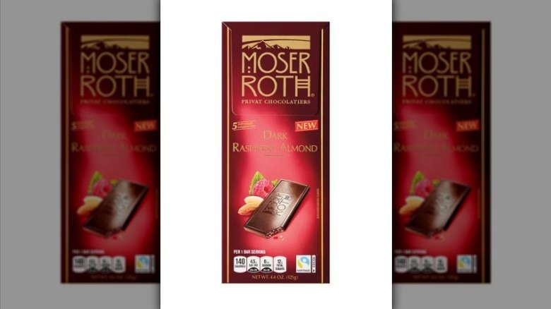 Raspberry almond dark chocolate bar on white background