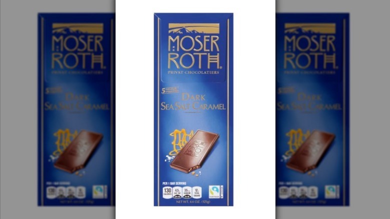 Sea salt caramel dark chocolate bar on white background
