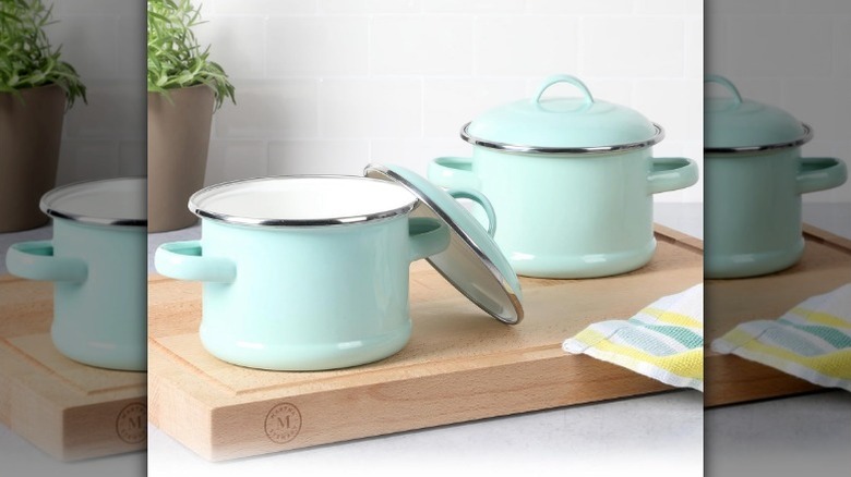 2 piece mini Dutch oven set on wood cutting board