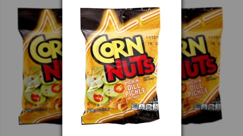 Dill pickle corn nuts on white background